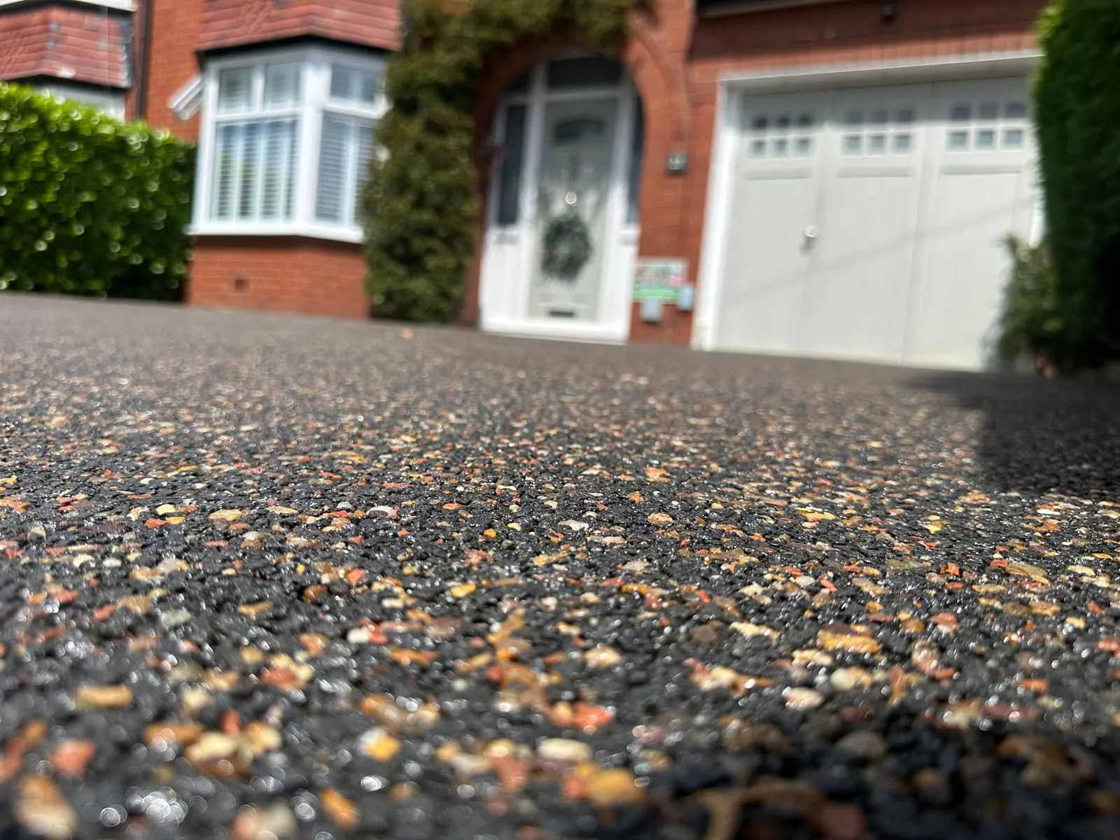 Amber resin bound aggregate close-up, Manchester