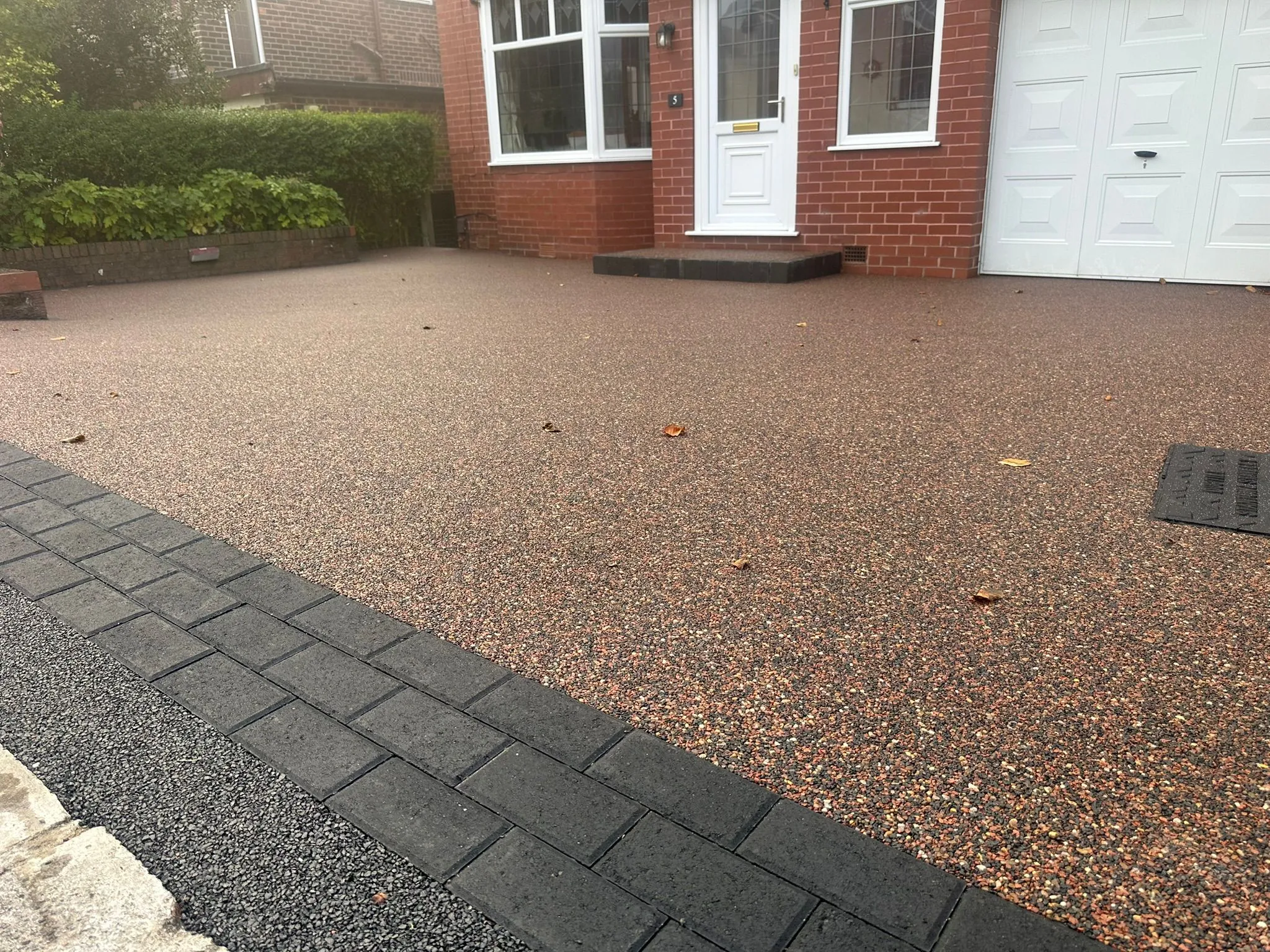 Autumn red resin driveway at semi-detached home, Manchester