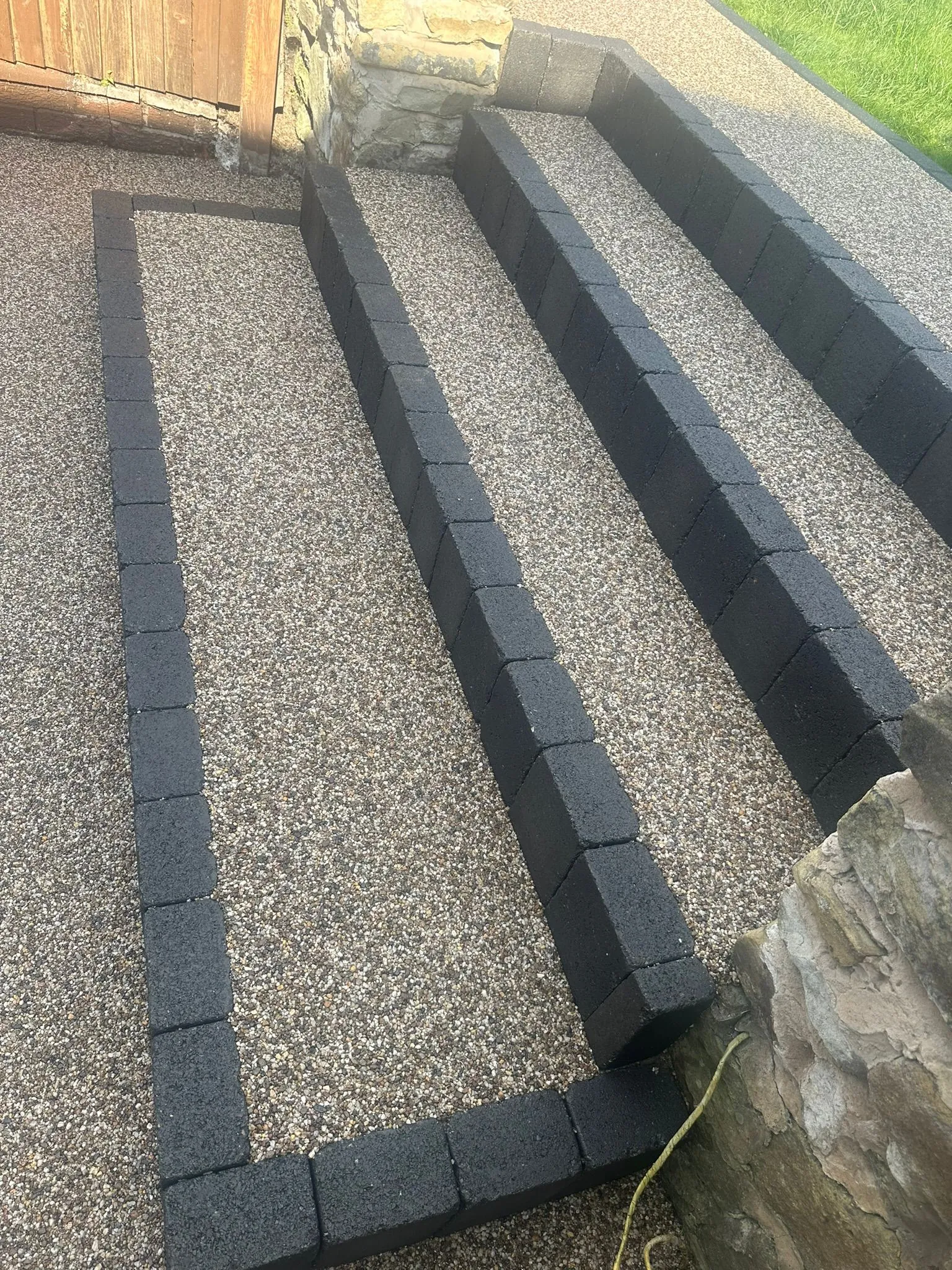 Black resin driveway with steps border, Manchester