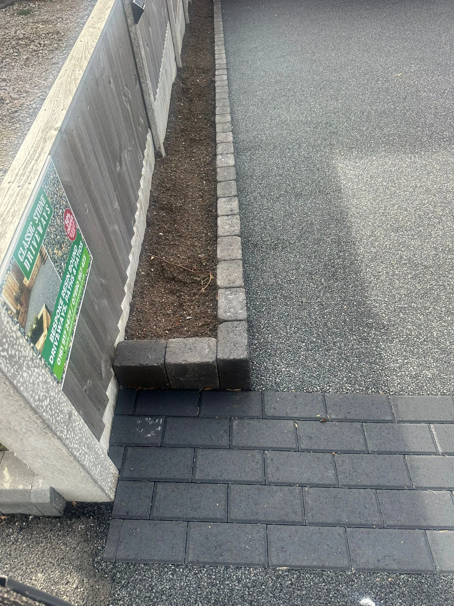 Block edging on resin driveway installation, Manchester
