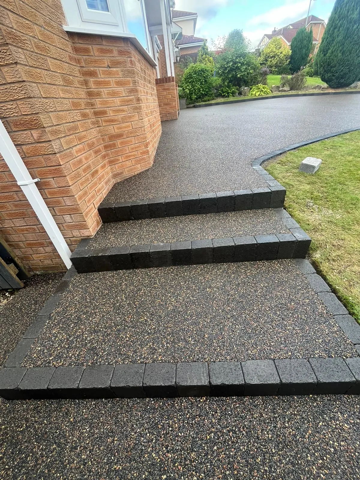 Block paving steps with resin bound gradient, Manchester