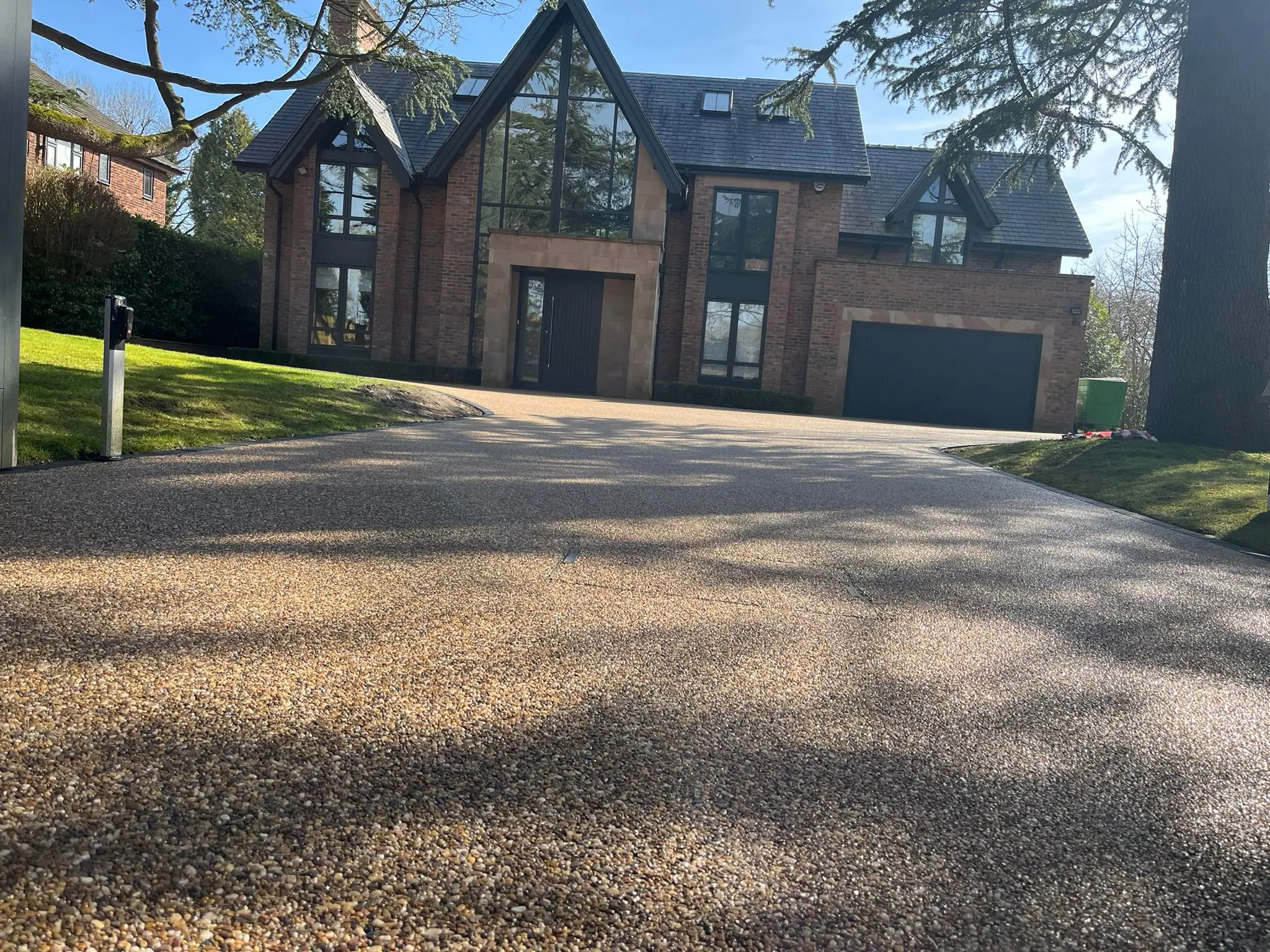 Bronze resin drive at contemporary home, Manchester