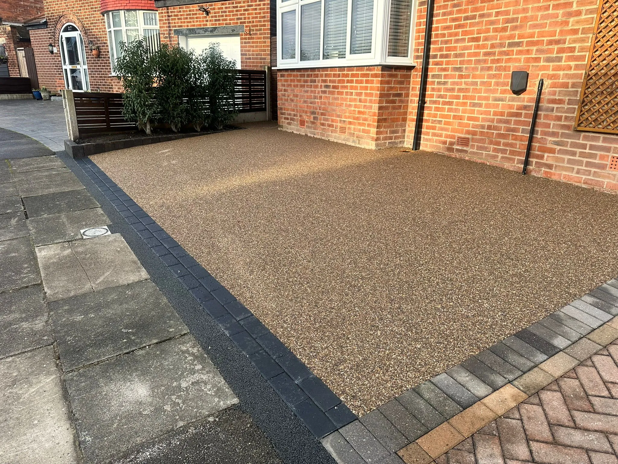 Bronze resin drive with rear patio garden, Manchester