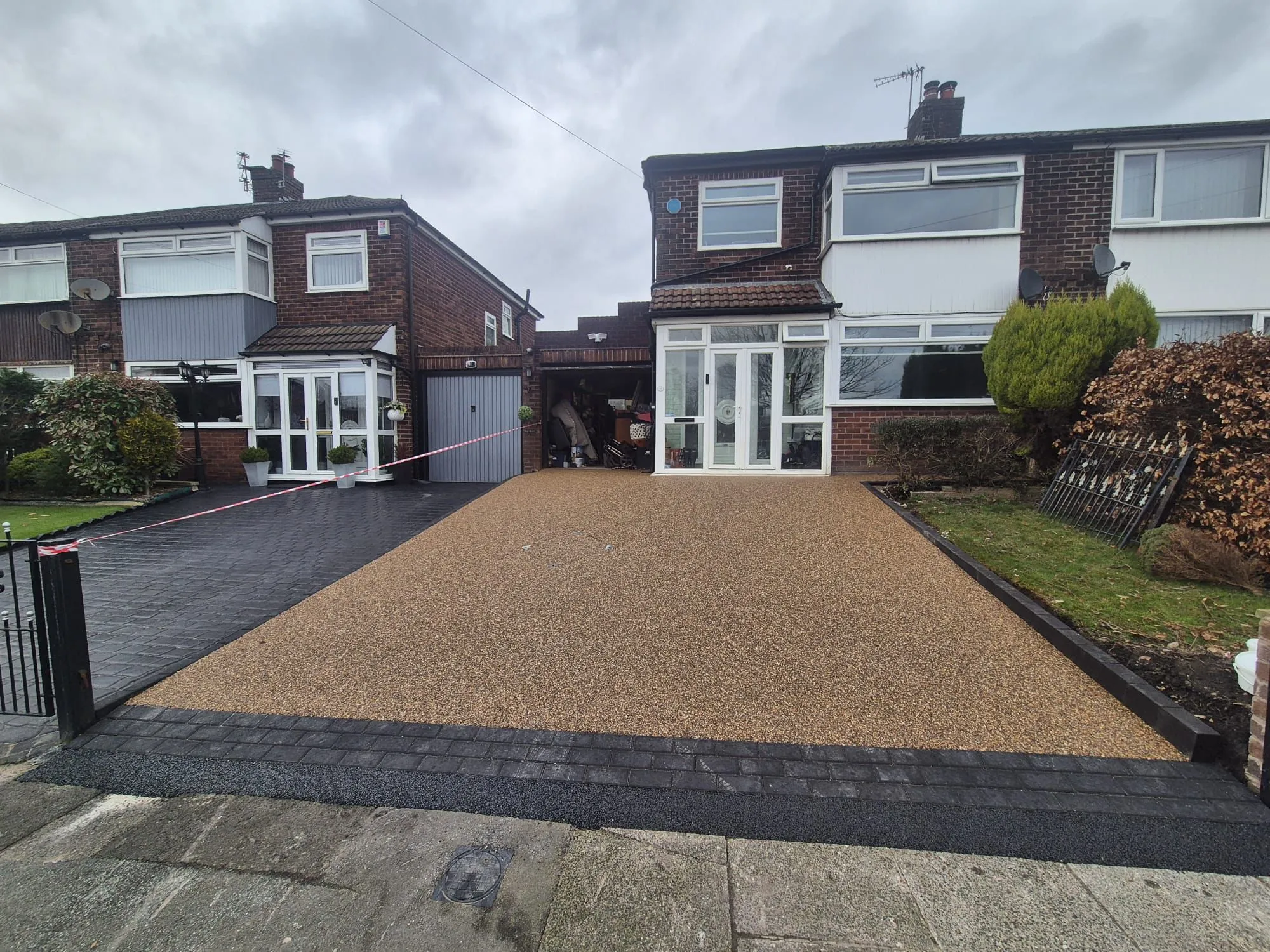 Bronze resin drive at semi with black border edging
