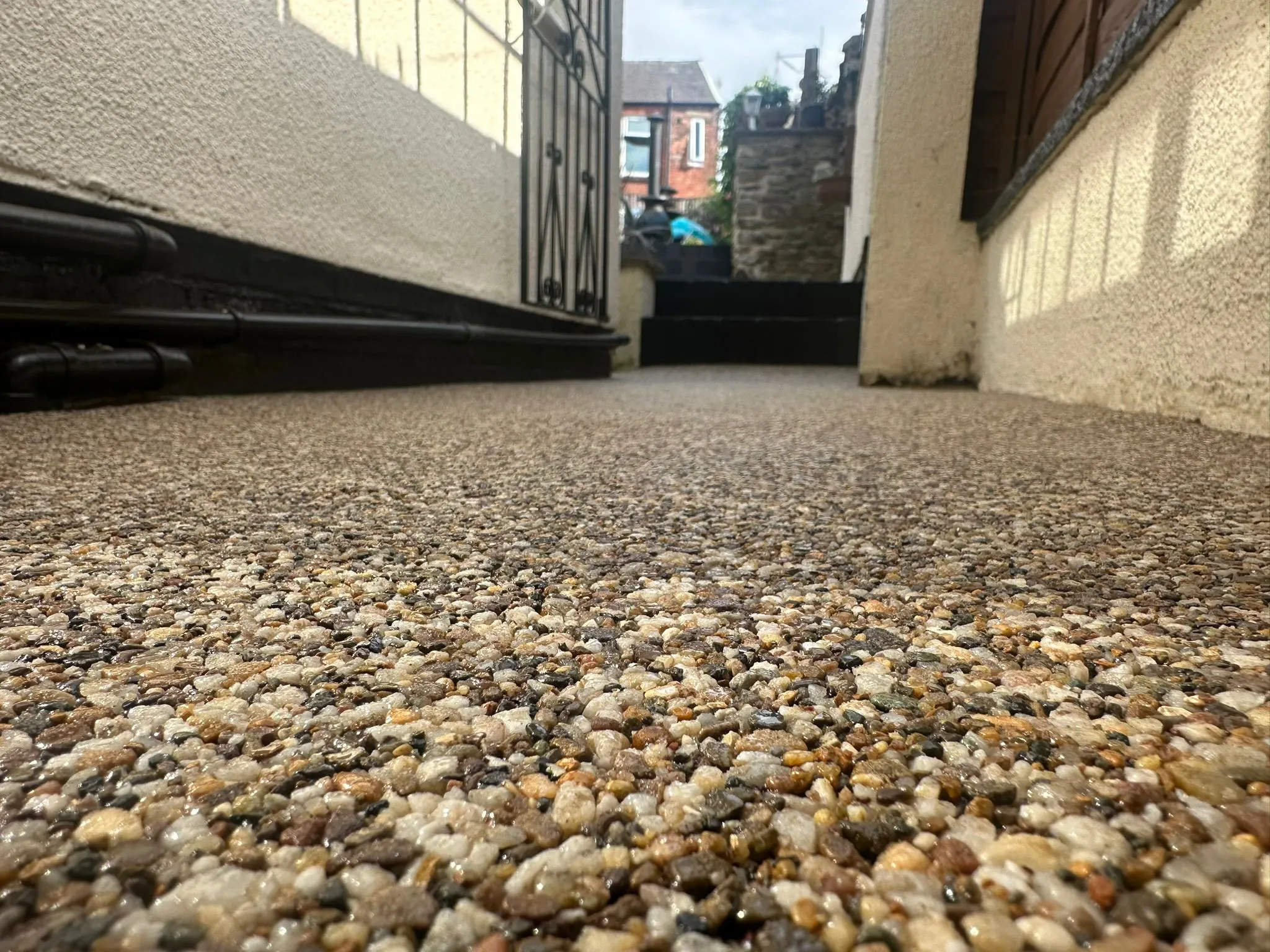 Bronze resin pathway in side alley, Manchester