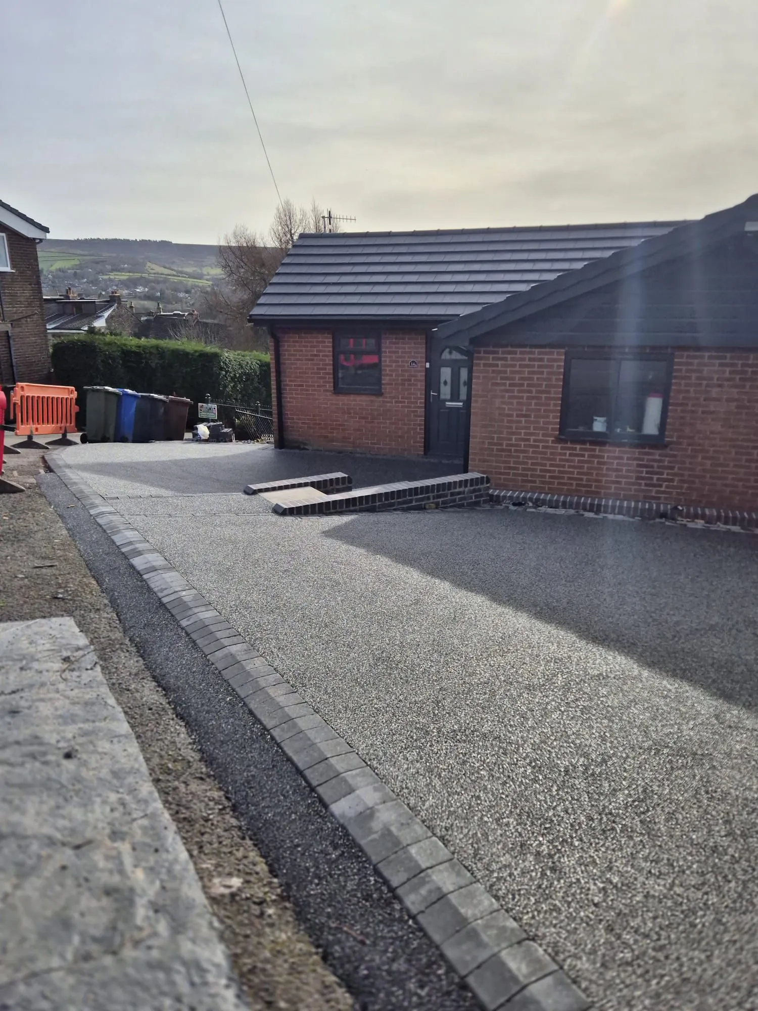Charcoal resin driveway with bungalow ramp, Manchester