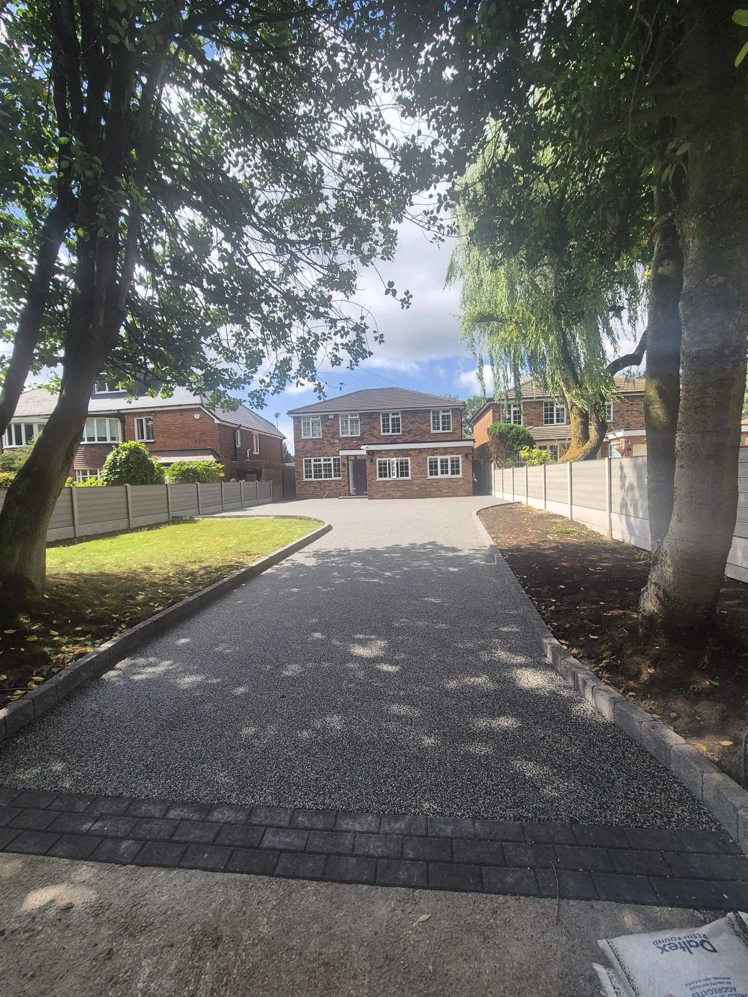 Charcoal resin driveway at large detached home, Manchester