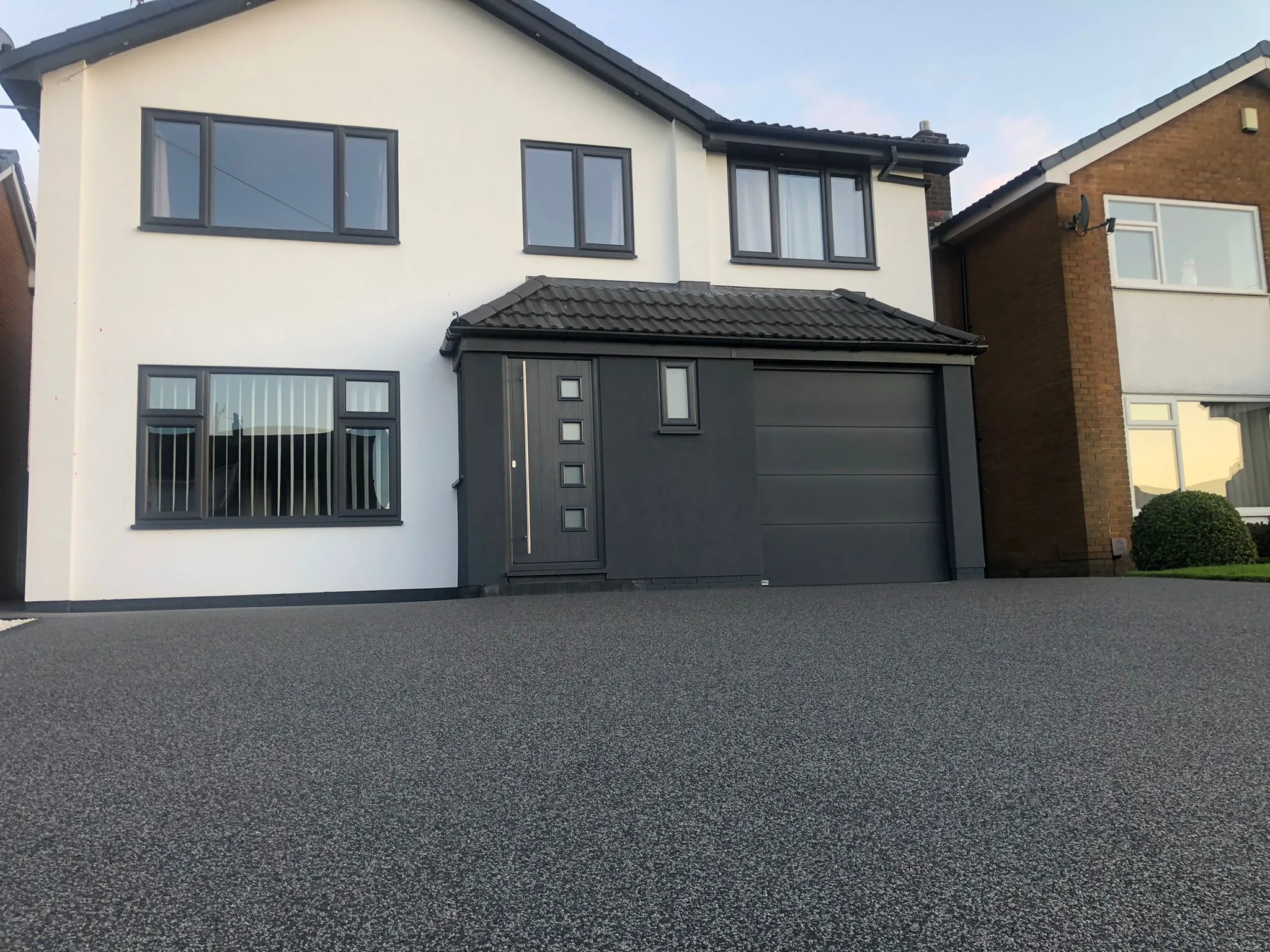 Charcoal resin bound driveway at a modern detached home, Manchester