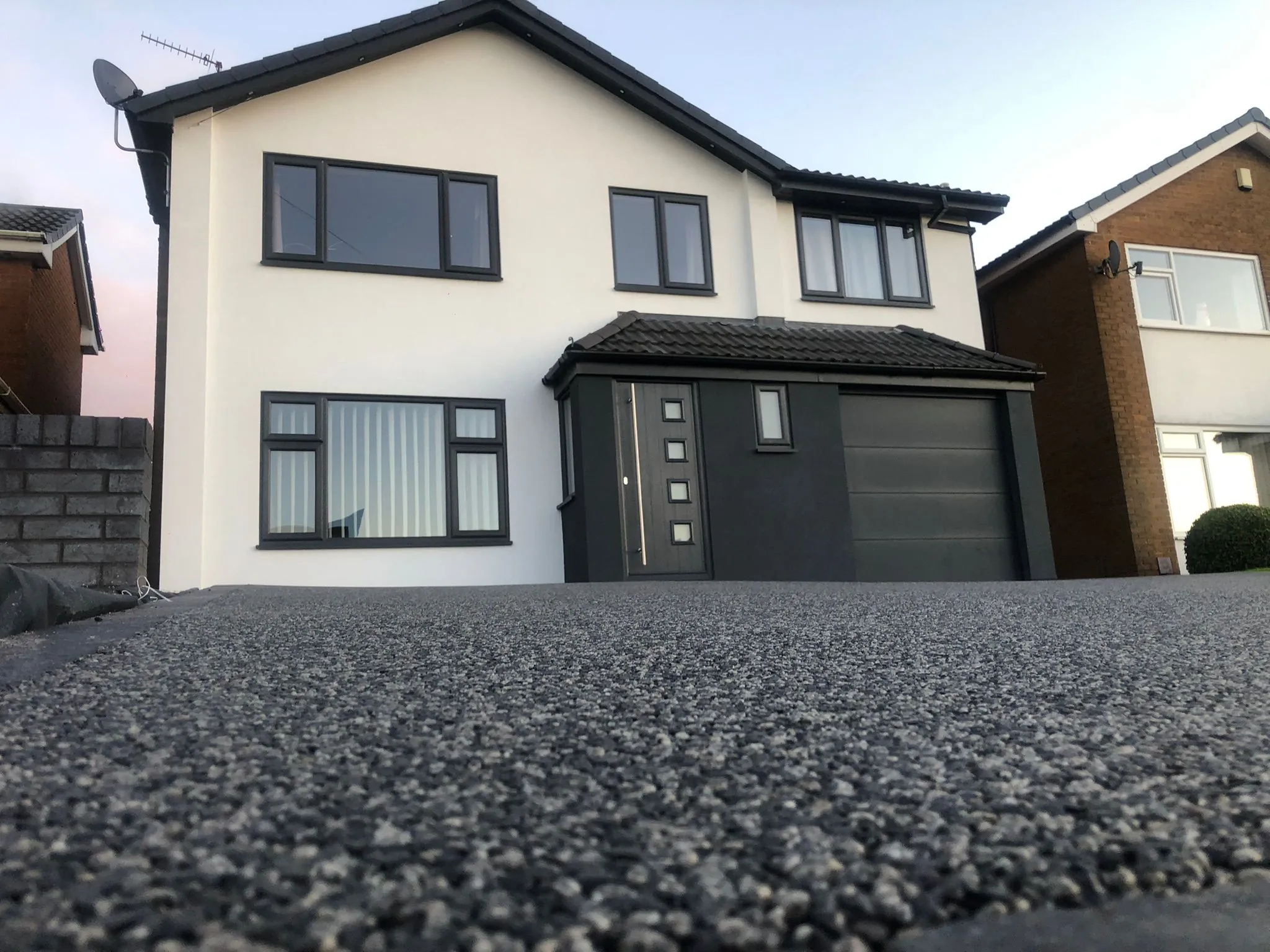 Charcoal resin driveway at new build detached home