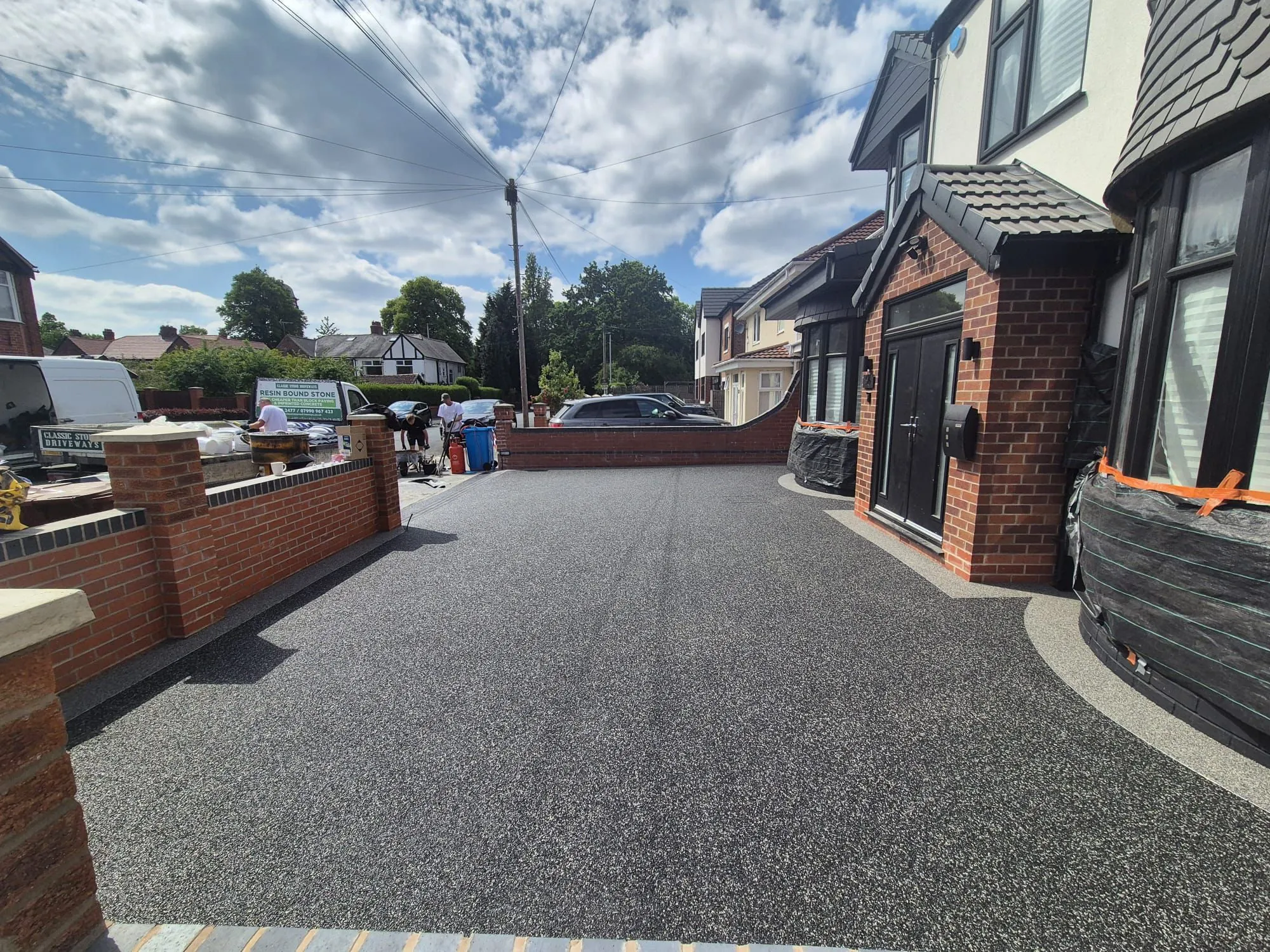 Charcoal resin driveway at new build semi, Manchester