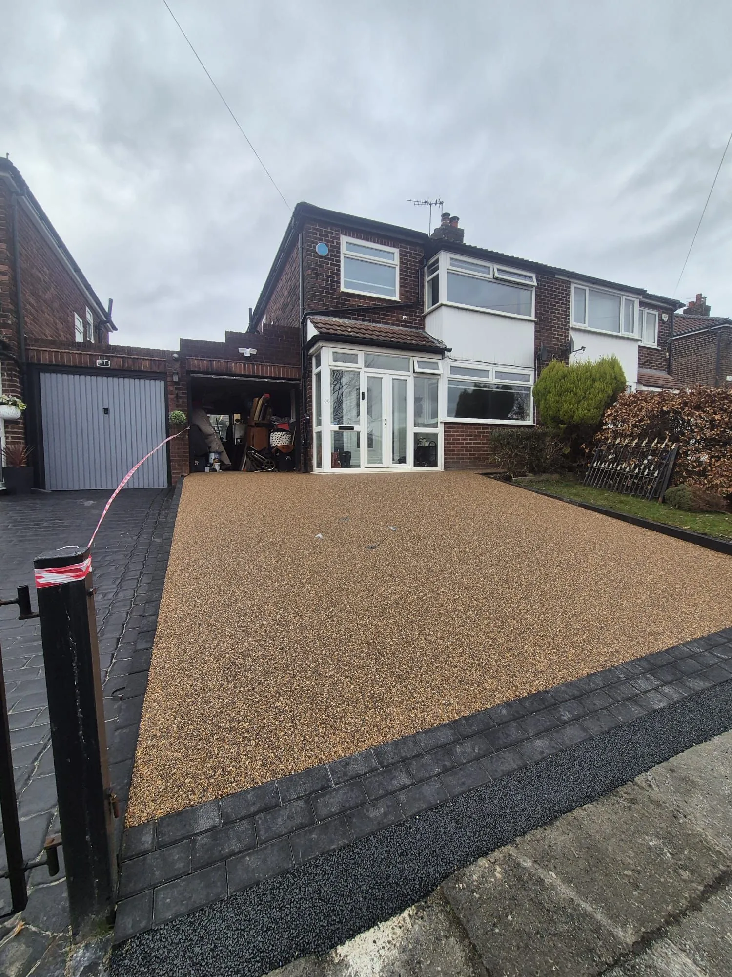 Golden resin bound driveway at semi-detached home, Manchester