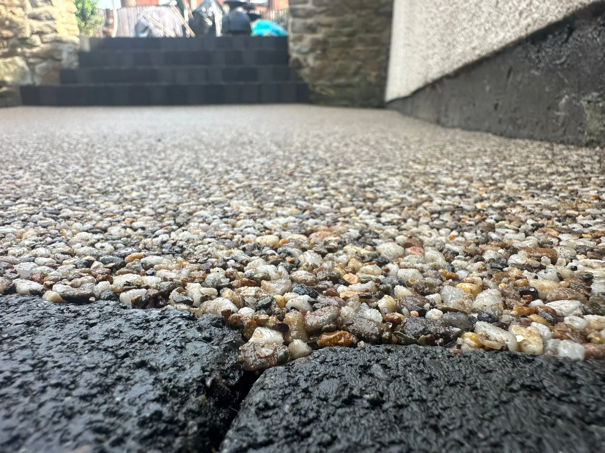 Black quartz resin bound drive detail close-up