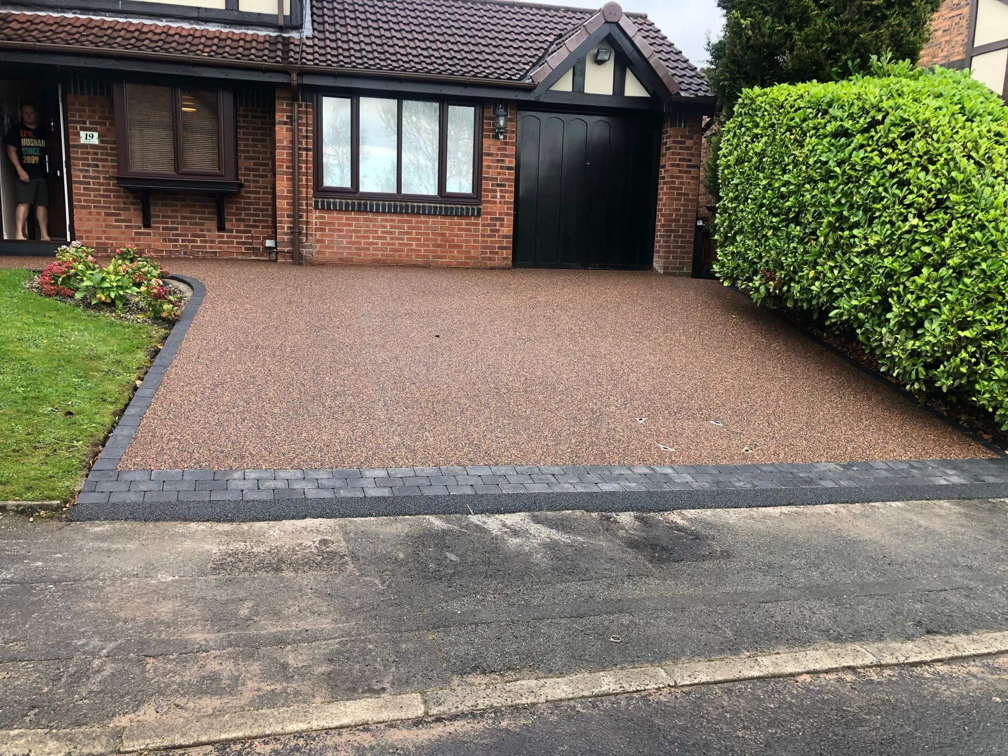Red bronze resin driveway at bungalow style semi, Manchester