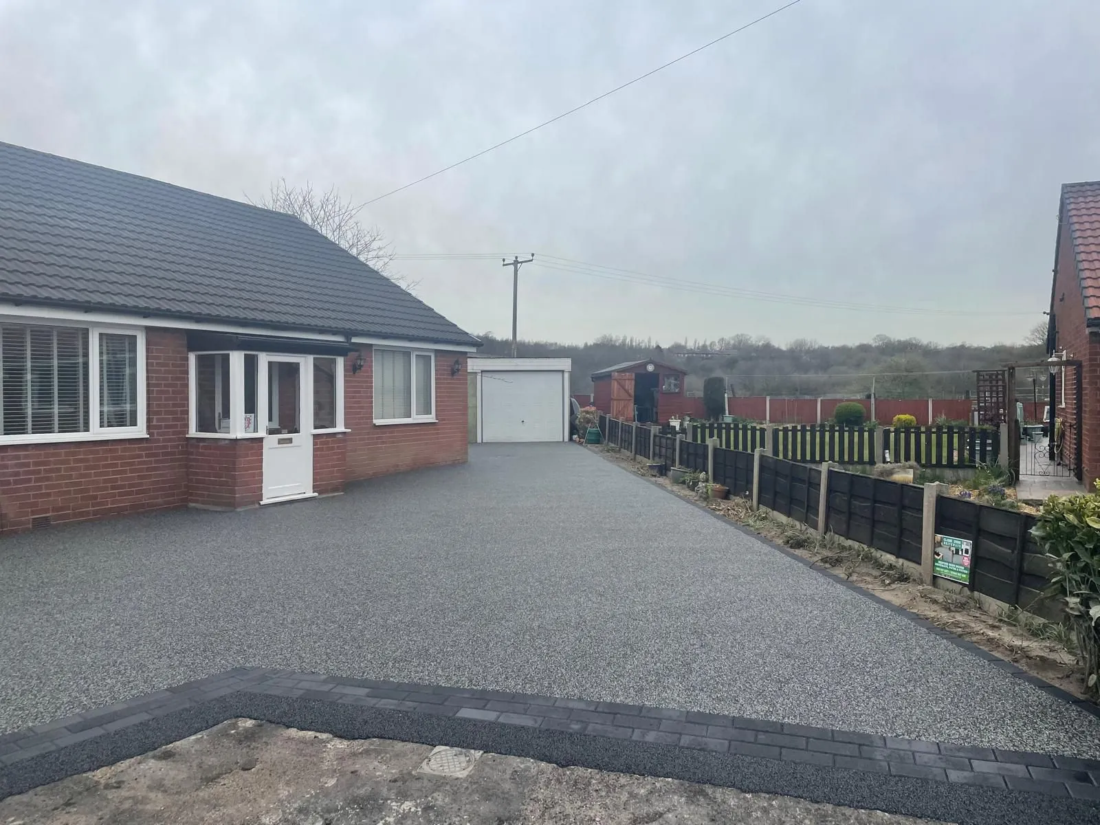 Silver resin bound driveway with bungalow view, Manchester