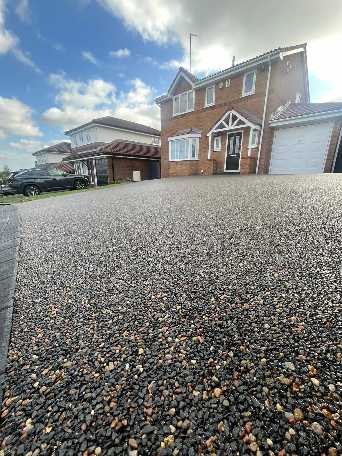 Featured resin bound driveway project at a new build home, Manchester