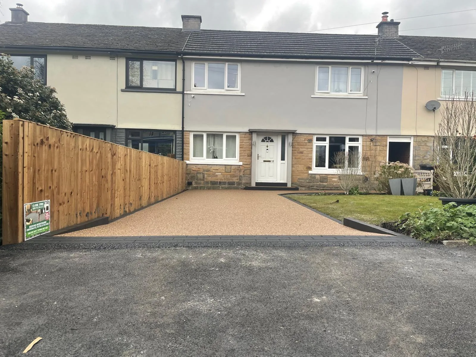 Golden resin driveway at a terraced home, Manchester
