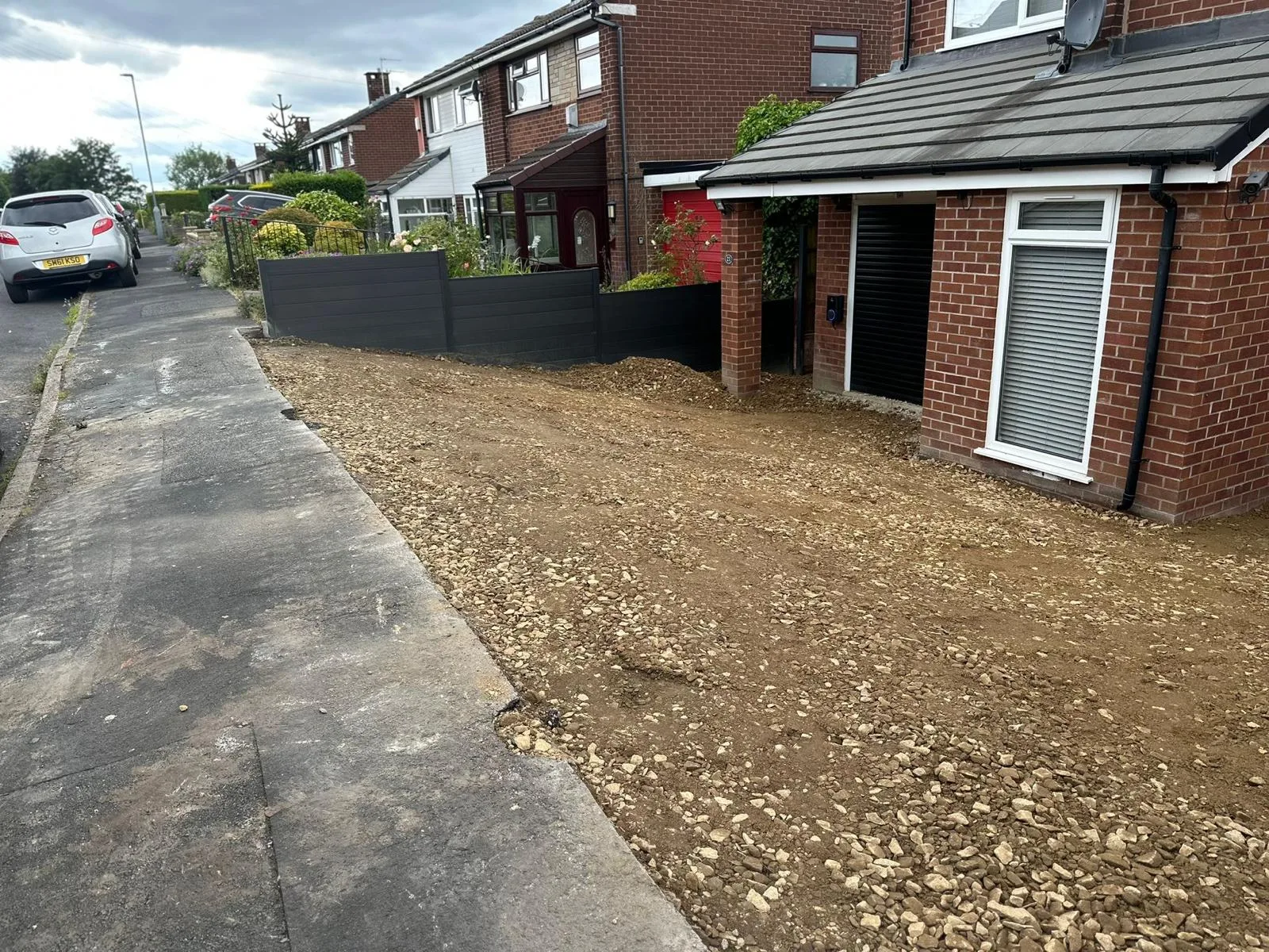 Front garden in Dukinfield excavated and cleared during resin driveway installation