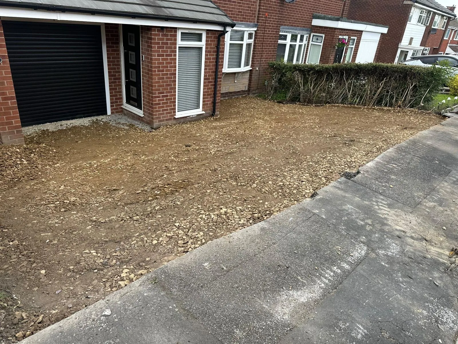 Front garden in Dukinfield excavated and prepared before resin driveway installation