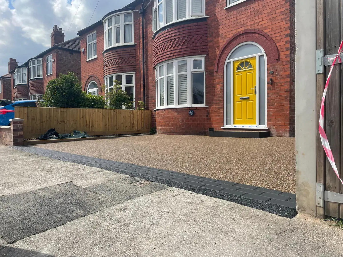 Brittany Bronze resin driveway running the full width of the Heaton Moor frontage