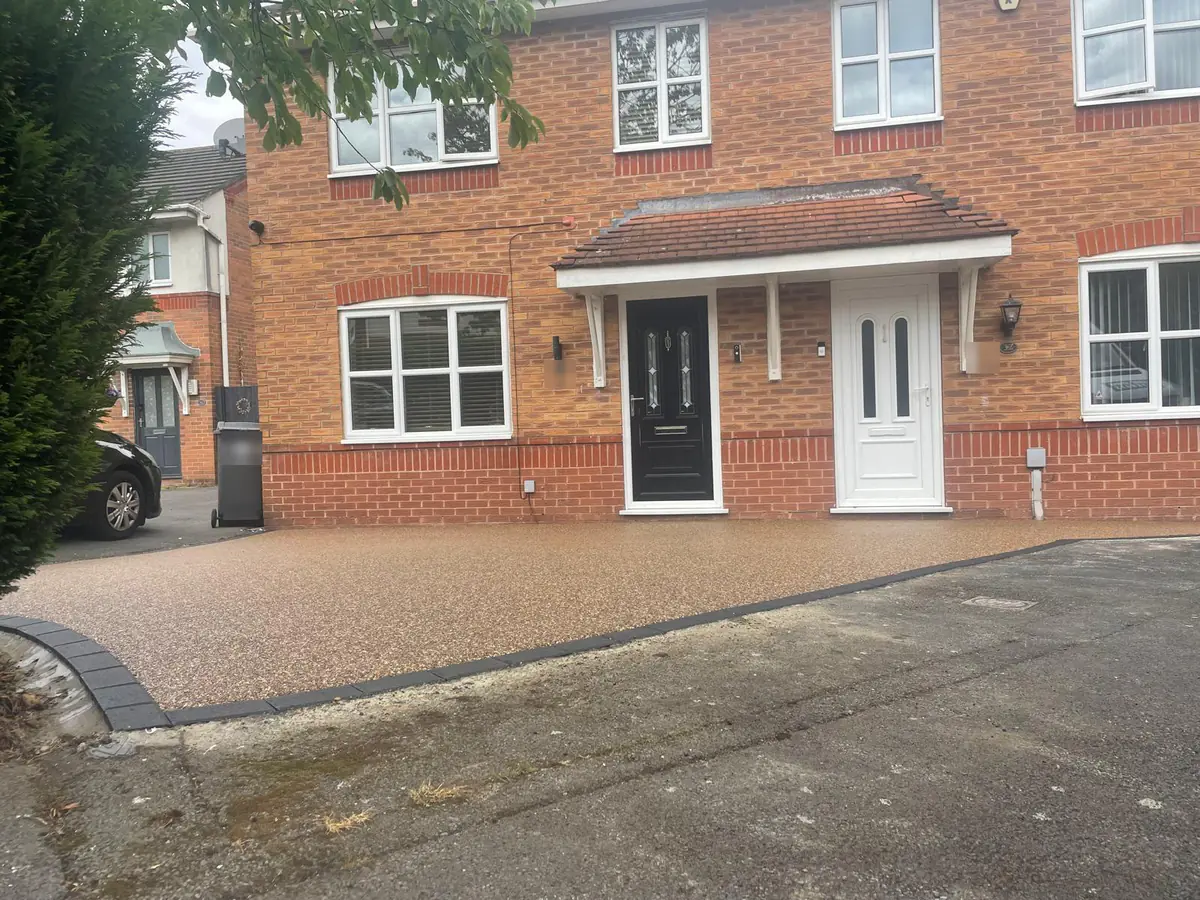 Golden Pea resin bound driveway running the full frontage of the Hyde property