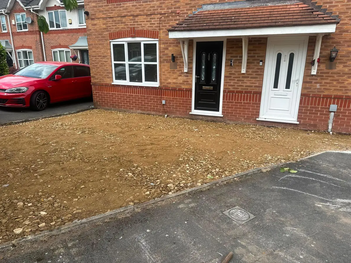 The Hyde driveway excavated back to subgrade in front of the property